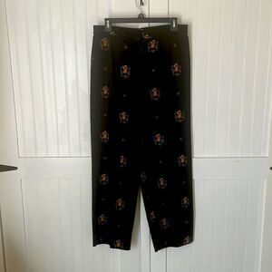 Talbots petites size 10 black pants with horseshoe/ saddle embellishments.